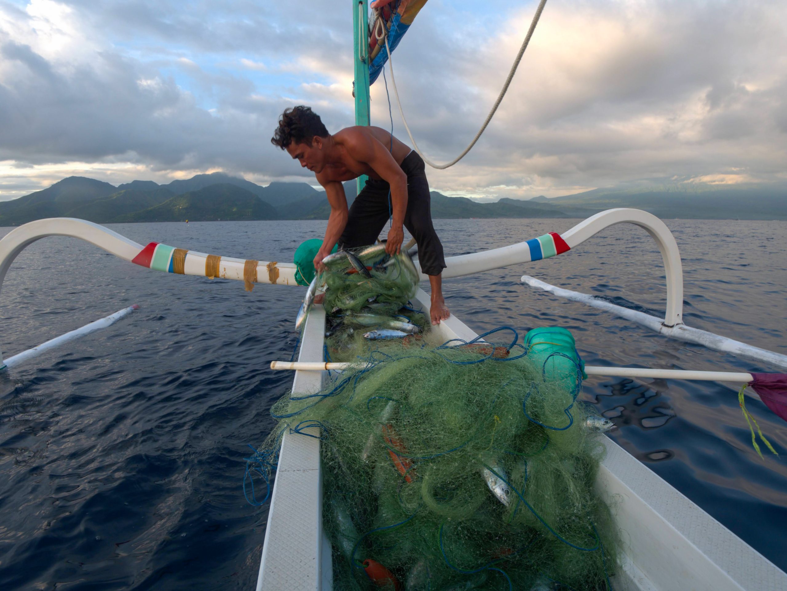 14Wayan used to be a snorkeling instruction before the pandemic. But, during the pandemic, he goes fishing everyday to support his family and community in order to make ends meet